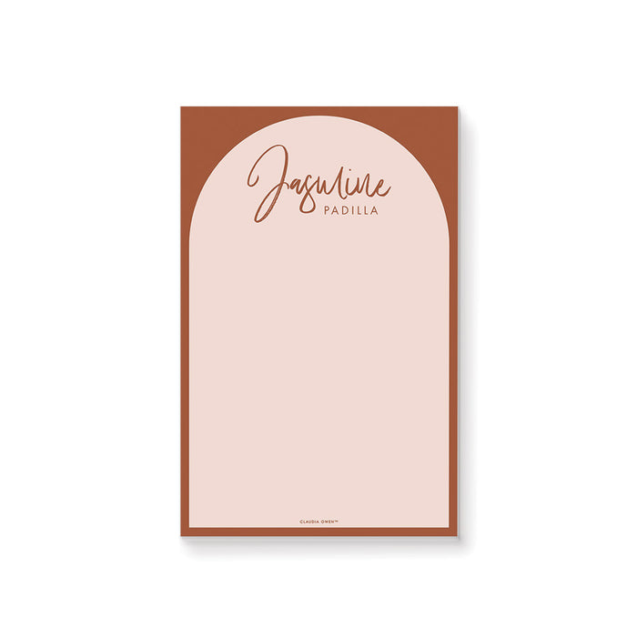 personalized terracotta arch notepad with custom name, blush writing area, warm rust border, and minimalist stationery design