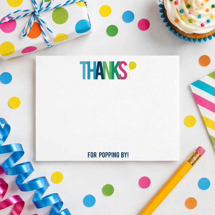 Personalized thank-you note card with colorful THANKS lettering, a yellow balloon accent, and “For Popping By!” message.