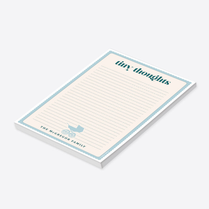 Personalized baby notepad with soft blue border, baby stroller illustration, lined pages, Tiny Thoughts heading, and family name-side