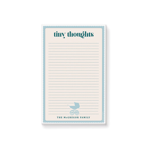 Personalized baby notepad with soft blue border, baby stroller illustration, lined pages, Tiny Thoughts heading, and family name