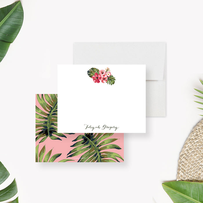 Personalized Tropical Hibiscus Note Cards. Front and pink back with green tropical leaves shown with a white envelope.