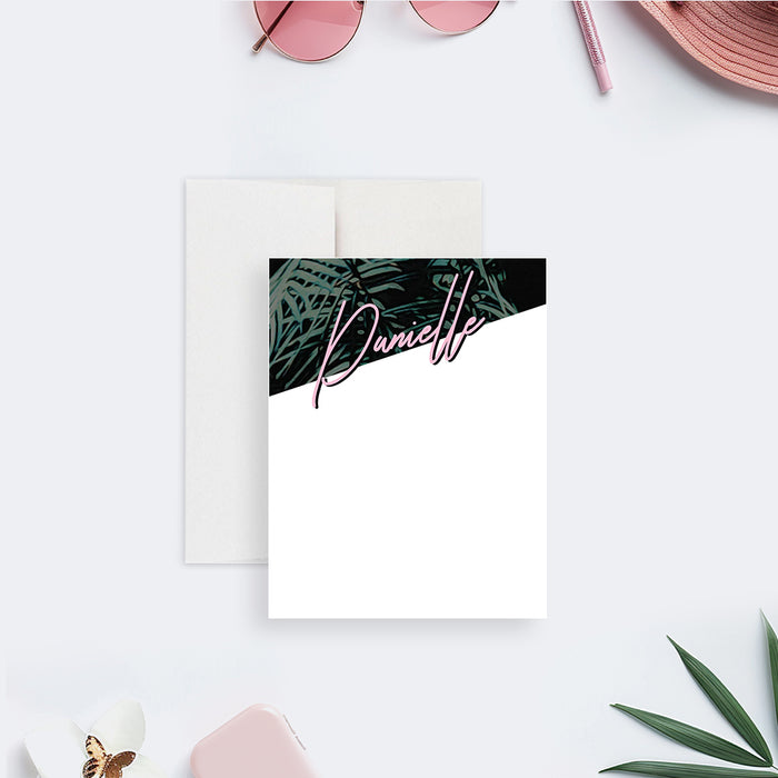 personalized tropical note card with dark palm leaf design and pink script name on a clean white writing area-front