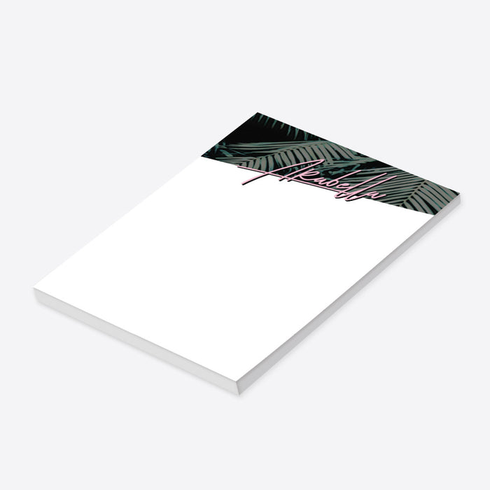 personalized tropical notepad with dark palm leaf border and pink script name on a white writing area-side