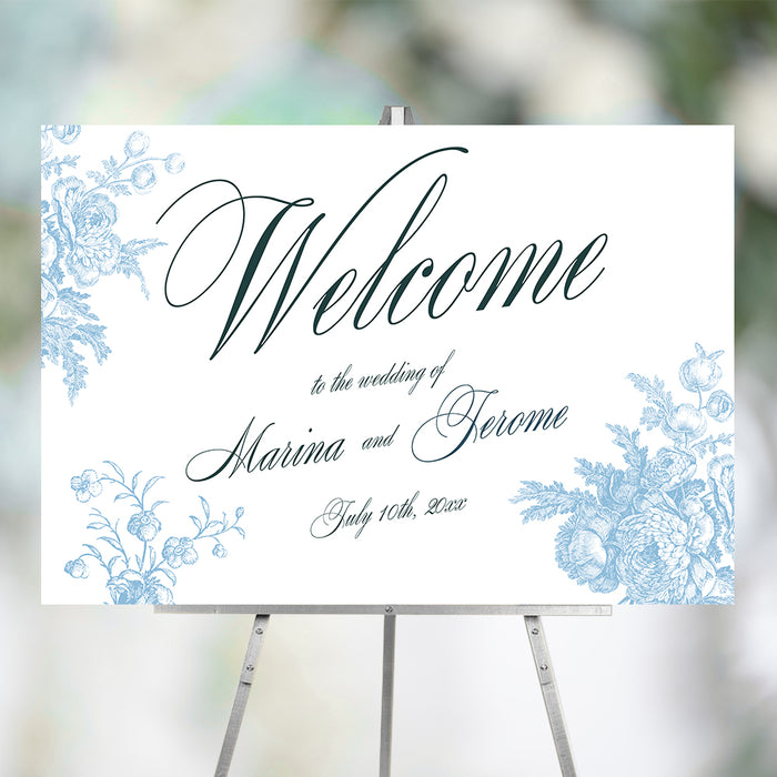 Personalized vintage blue floral wedding welcome sign with botanical corner illustrations, custom couple’s names and wedding date