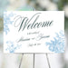 Personalized vintage blue floral wedding welcome sign with botanical corner illustrations, custom couple’s names and wedding date
