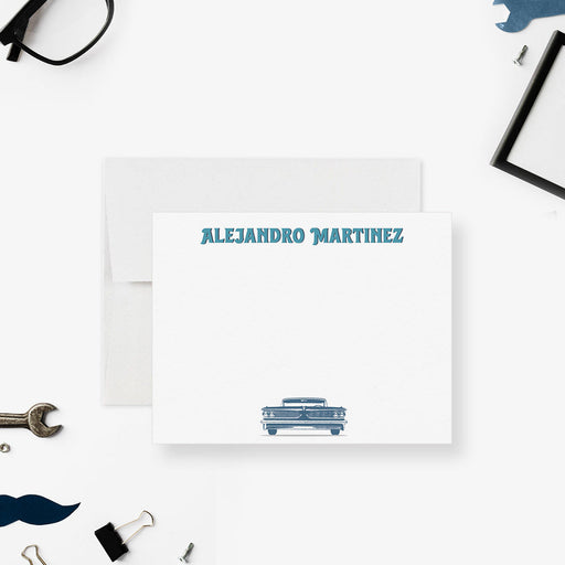 Personalized note card with a blue vintage car illustration and a personalized name, shown with a white envelope.