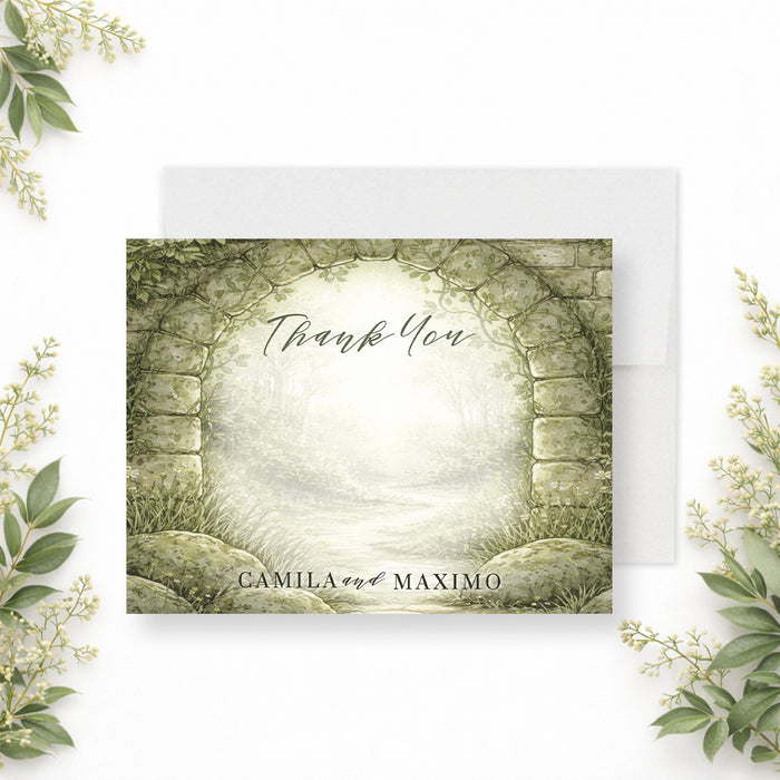 Personalized watercolor forest garden wedding thank you card with stone arch, woodland greenery, Thank You wording and couple’s names-front