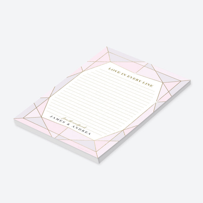 personalized blush pink wedding notepad with jewel-inspired geometric frame, lined pages, refined lettering, and custom couple names-side
