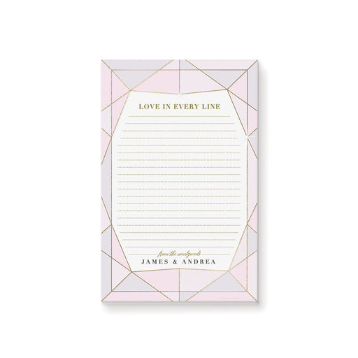 personalized blush pink wedding notepad with jewel-inspired geometric frame, lined pages, refined lettering, and custom couple names