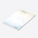 Custom notepad with a cream and blue watercolor wash background, personalized with names, perfect for elegant stationery or wedding party favors.-side
