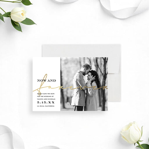 Custom save-the-date card featuring the couple’s photo, modern design, and gold script typography, with personalized wedding details.-front