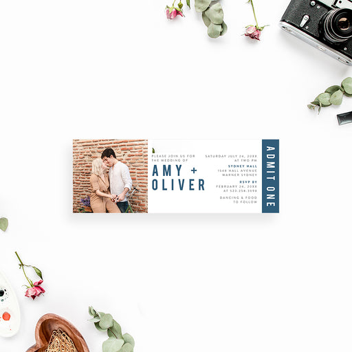 Modern ticket-style wedding invitation featuring a romantic couple photo and custom wedding details