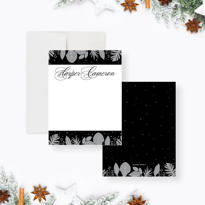 personalized winter botanical note card with custom name, gray foliage accents, black and white design, and blank writing space-front-back