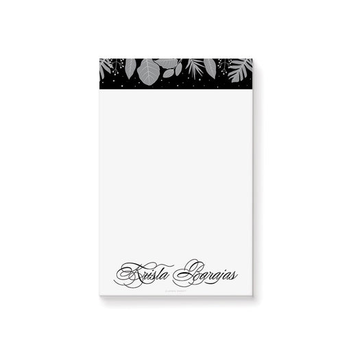 personalized winter botanical notepad with gray foliage accents, custom name, elegant script lettering, and blank writing space