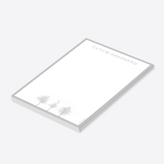 Personalized winter notepad featuring delicate snowy trees and minimalist gray design, perfect custom stationery for notes and messages.-side