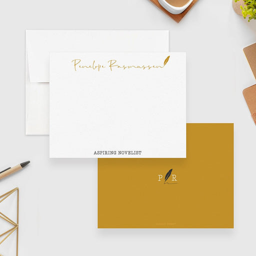 Writer note cards with a printed gold name, quill and “Aspiring Novelist” on white; mustard yellow back with initials and a black quill.