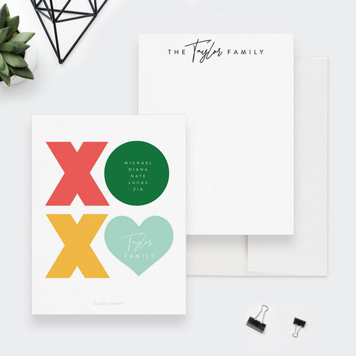 Personalized family note cards with a family name on white and colorful XOXO lettering and names on the reverse.