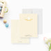 Personalized Yellow Bunny Note Cards for Kids. Front and yellow and cream patterned back shown with a white envelope.