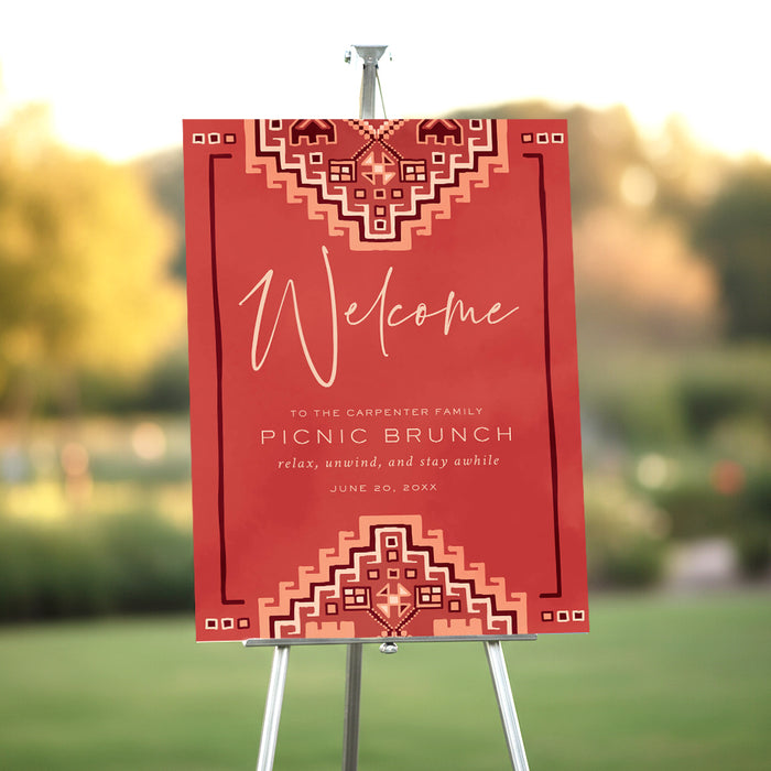 Personalized welcome sign with a red quilt pattern for a summer picnic brunch in the park