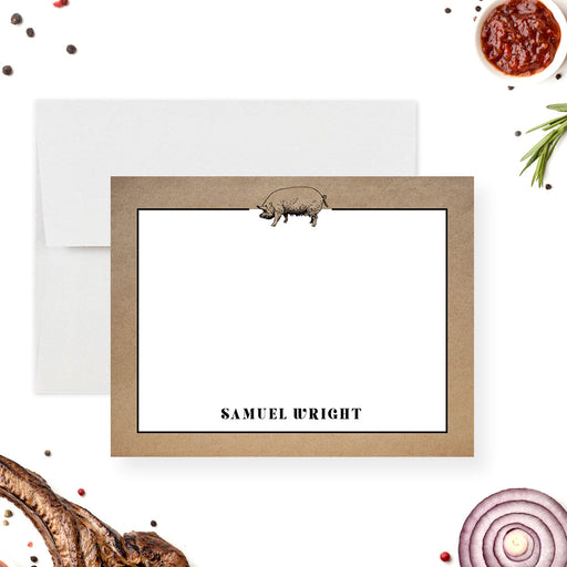Personalized note card with a white front with a small pig illustration, brown textured border, and personalized name. Shown with a white envelope.