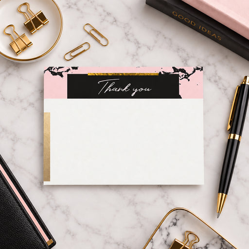 Pink and black marble thank-you note card with scripted header, printed gold detail and coordinating reverse