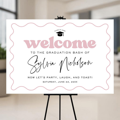 Personalized graduation welcome sign with pink design, custom name, and graduation cap displayed as party entrance sign for Class of 2026
