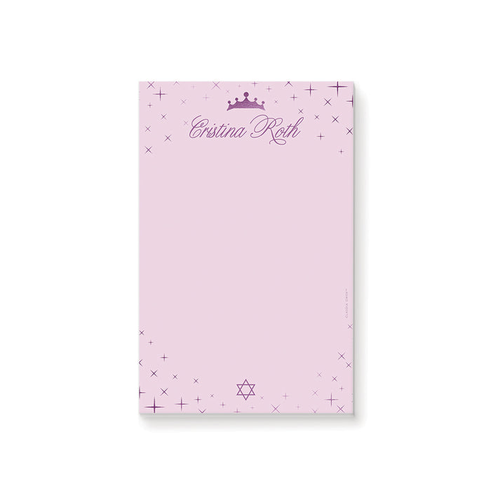 Personalized bat mitzvah notepad in pink and purple with princess crown, star accents, and custom name in elegant script.