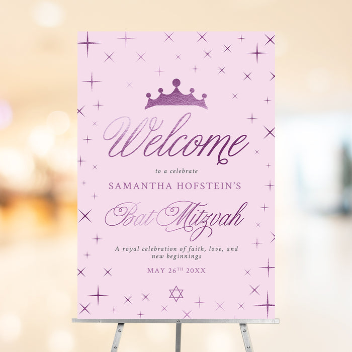 Bat mitzvah welcome sign in pink and purple with princess crown, star accents, and elegant script text for a party entrance display.