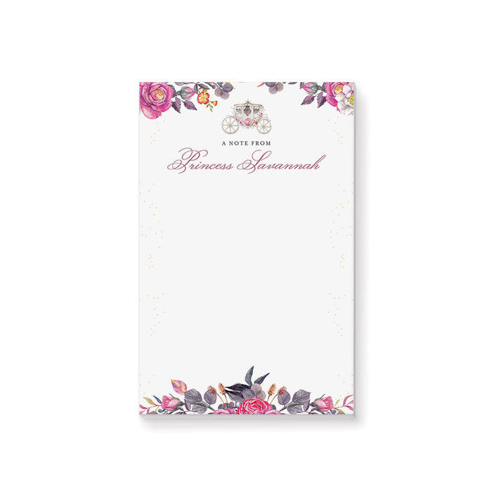 Personalized notepad featuring a pink floral design and a royal carriage illustration for girls' princess-themed birthday parties.