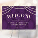 Lingerie shower welcome sign featuring a tufted deep purple background with cascading pearl accents
