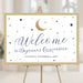 Celestial welcome sign featuring a crescent moon and navy and gold stars, perfect for a quinceañera entrance sign, venue decor, or photo backdrop.