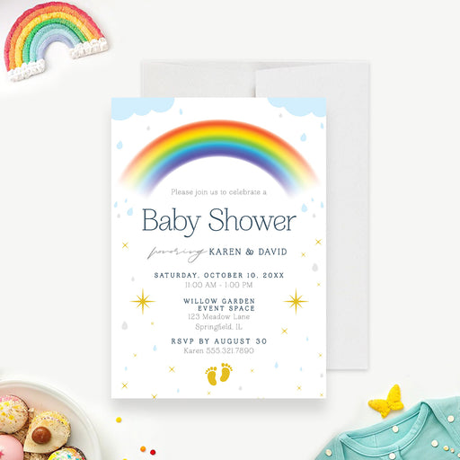 Rainbow baby shower invitation with colorful rainbow arch, pale blue clouds, raindrops, yellow stars, baby footprints and personalized event details-front