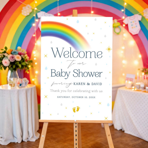Baby shower welcome sign with colorful rainbow, blue and gray raindrops, yellow stars, baby footprints, parents’ names and event date