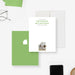 Real Estate Thank You Note Cards with Personalized Photo. Front and green back with a white house-shaped photo area shown with a white envelope.