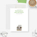 Personalized note card with a white front with green business wording and a house-shaped photo near the bottom. Shown with a white envelope.