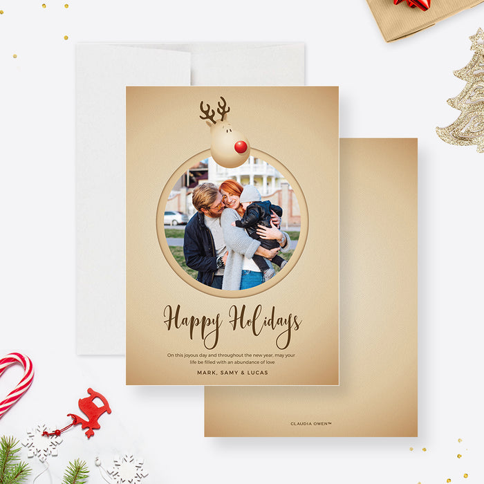 Front and back of the reindeer holiday photo card template with a round family photo and warm beige coloring.