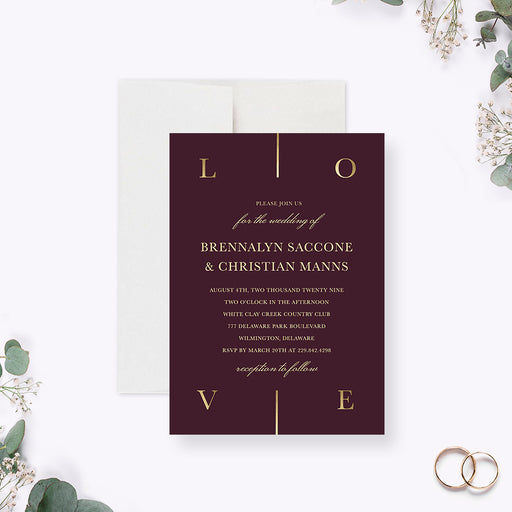 Burgundy wedding invitation with gold "L-O-V-E" framing in the corners-front