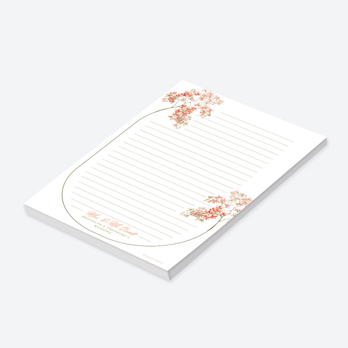 Custom floral wedding notepad featuring blush and coral blossoms, a botanical frame, lined pages, and personalized names—ideal for weddings or bridal showers.-side