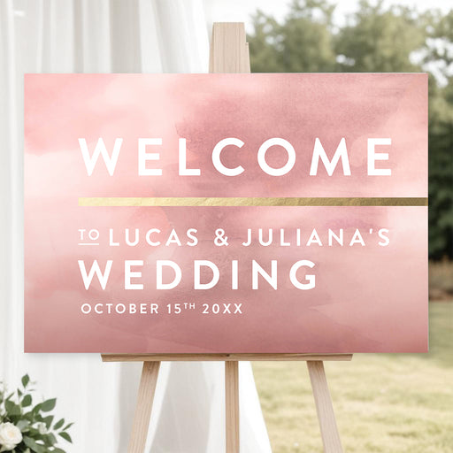 Elegant blush pink wedding welcome sign with gold accents for ceremony or reception entrance