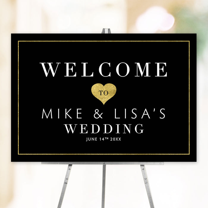 Romantic wedding welcome sign featuring elegant gold heart design on black background