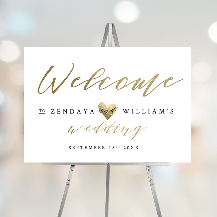 Personalized wedding welcome sign featuring elegant calligraphy and a heart detail, ideal for ceremony or reception decorations.