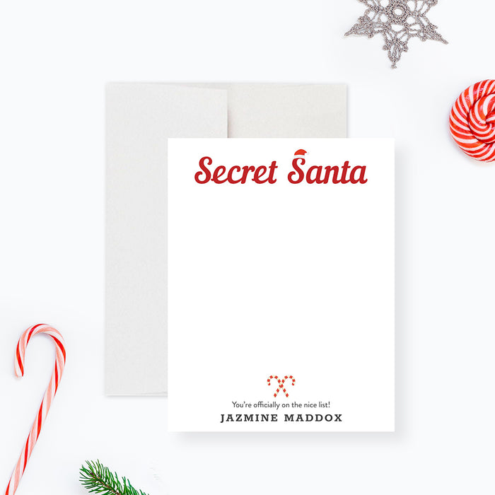 Secret Santa note card featuring a Santa hat and candy cane design, personalized Christmas stationery gift for the holiday season.-front