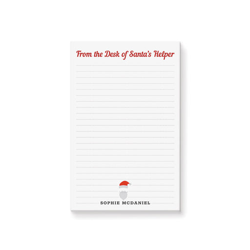 Christmas notepad with "From the Desk of Santa's Helper" and a Santa hat illustration, making it a perfect custom stationery gift this holiday season.