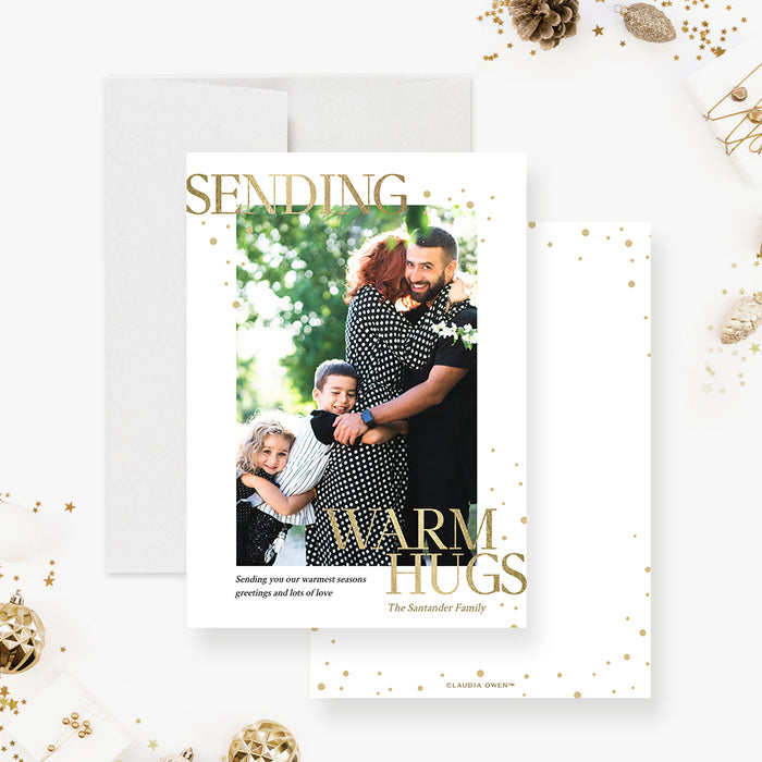 Digital holiday greeting card featuring a family photo with gold Warm Hugs text, perfect for modern Christmas messages and seasonal greetings.