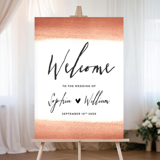 Romantic wedding welcome sign with modern calligraphy, watercolor brushstroke, and small heart design