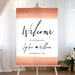 Romantic wedding welcome sign with modern calligraphy, watercolor brushstroke, and small heart design