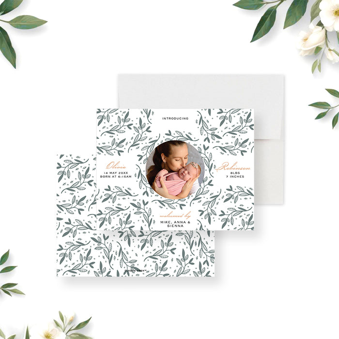 Botanical baby announcement card with circular newborn photo and green leafy pattern-front-back