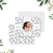 Botanical baby announcement card with circular newborn photo and green leafy pattern-front-back