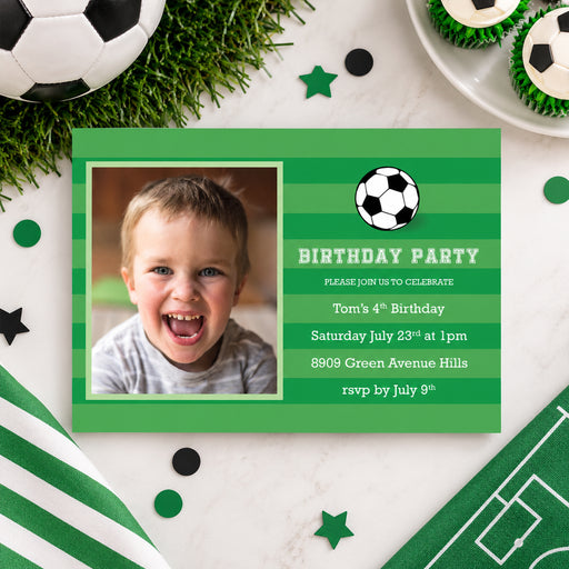 Personalized green soccer birthday invitation with a child’s photo, black-and-white soccer ball, green stripes, and custom birthday party details.