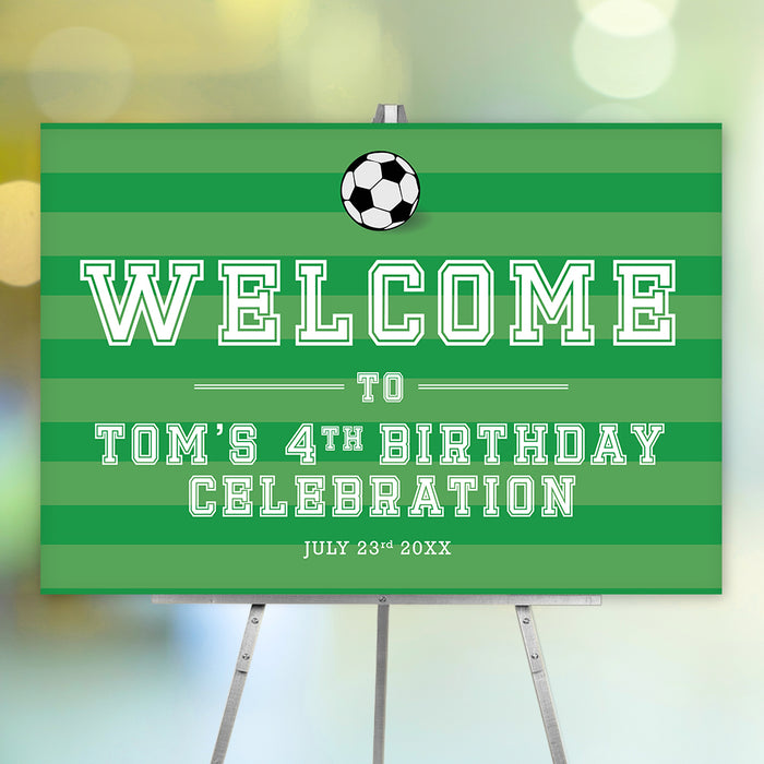 Green soccer birthday welcome sign with a black and white soccer ball, striped background, and personalized party details